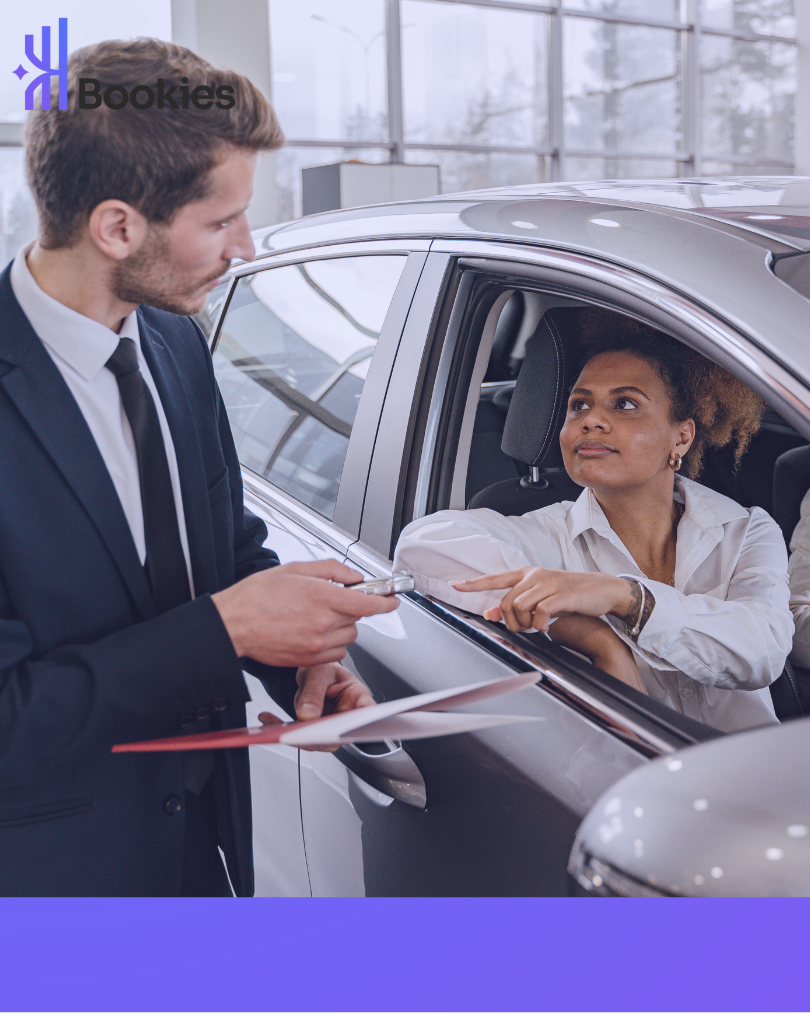 Entrepreneur chooses new car in the garage and discusses the deductibility of company cars from 2026.
